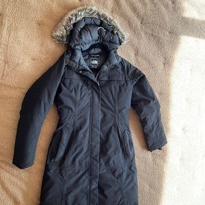 North face down filled parka, size small.